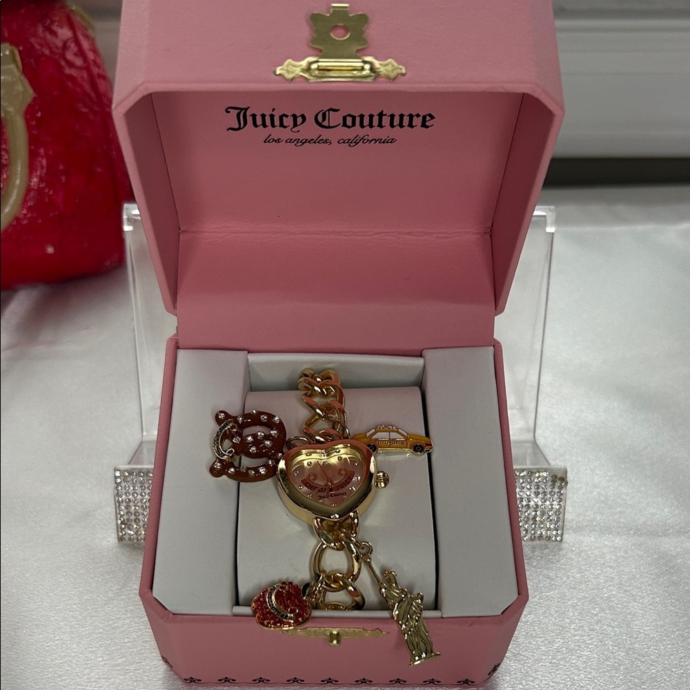 Brand New Juicy Couture gold watch with pretzel, taxi, Apple & statue liberty